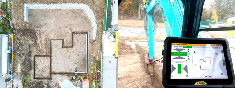 Erdbau Postl Bagger beim präzisen Vermessen mittels GPS-Technik